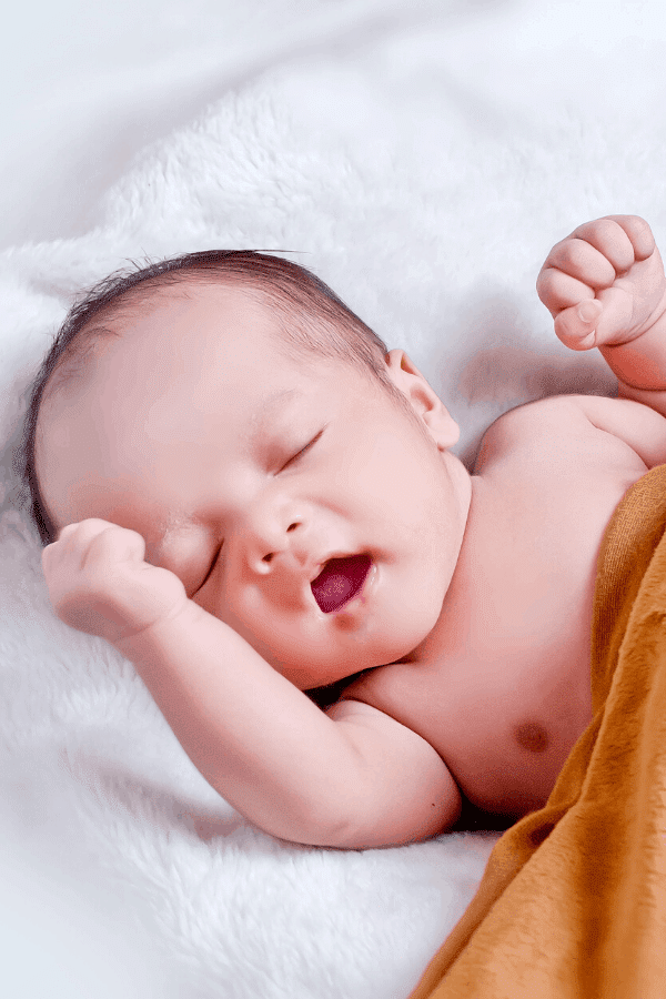 Baby sleeping with mouth open