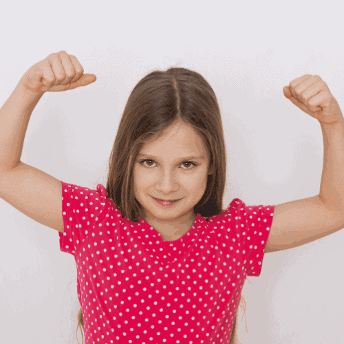 girl holding up her arms showing her muscles