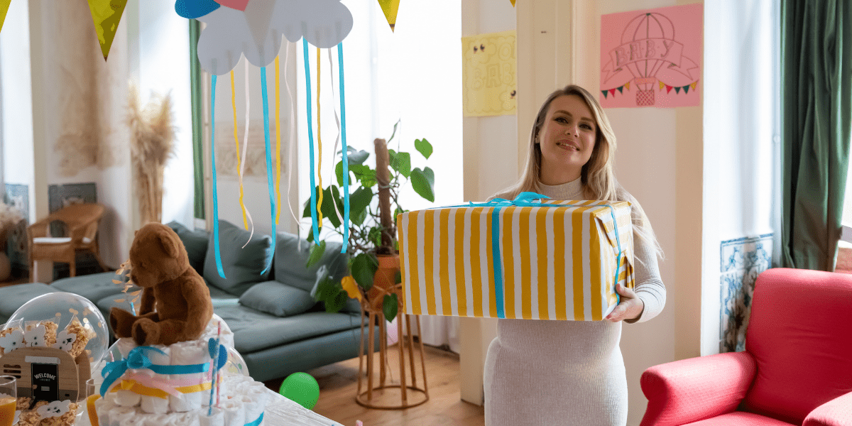 pregnant mum holding a gift