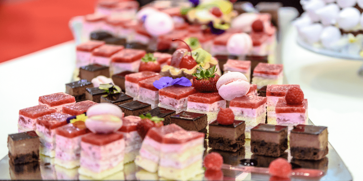 multiple cakes laid out on the table