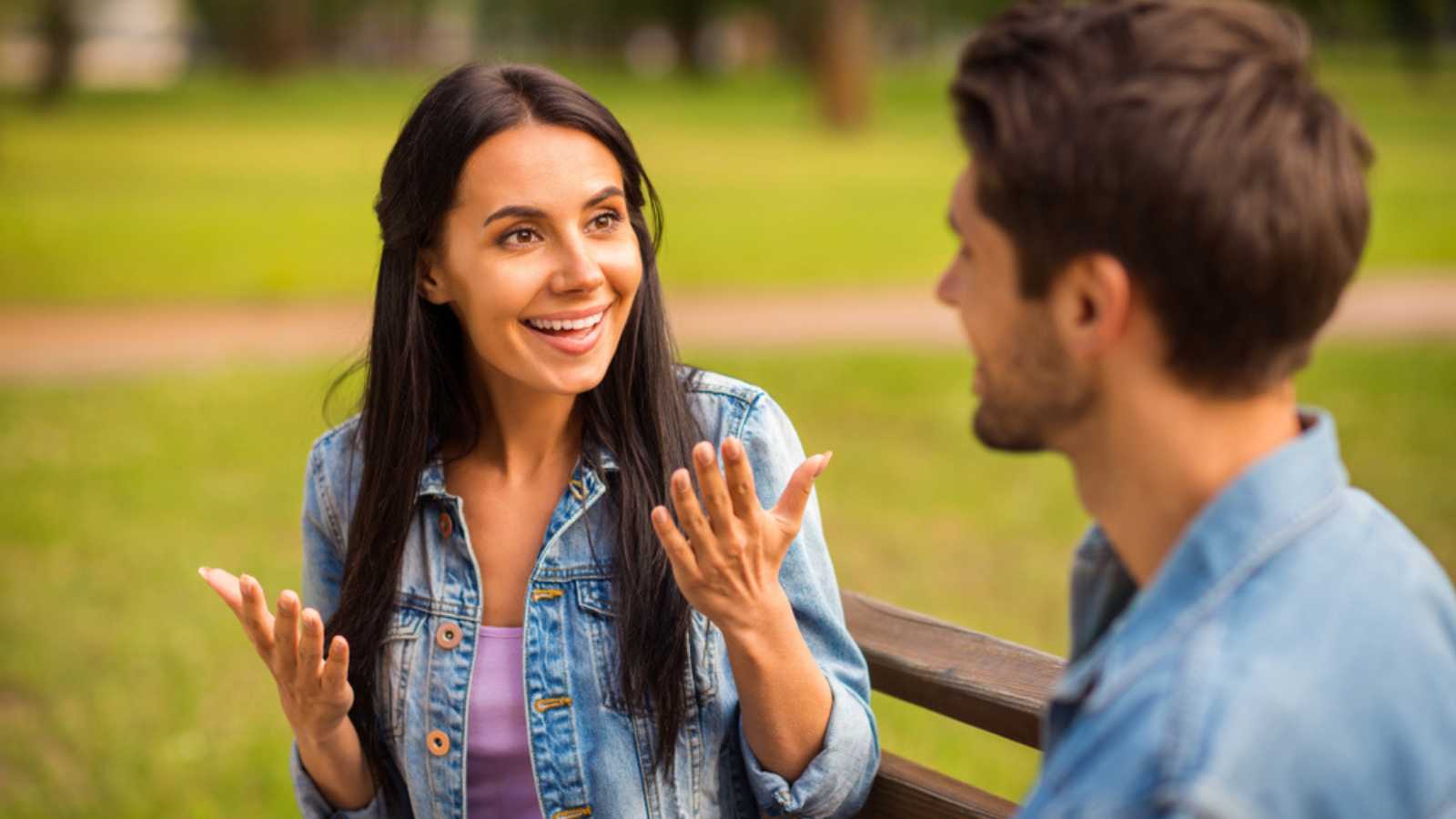 Woman talking with man